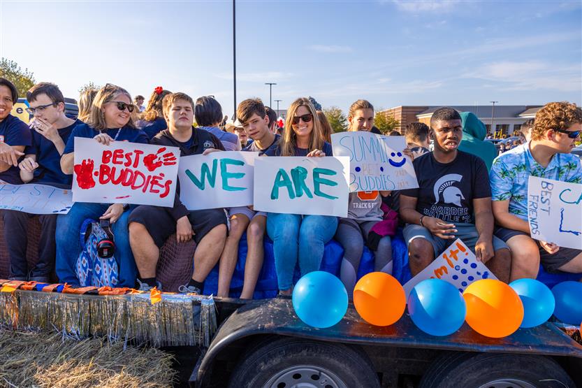 Students at the Summit High homecoming parade